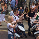 Children playing samba drums