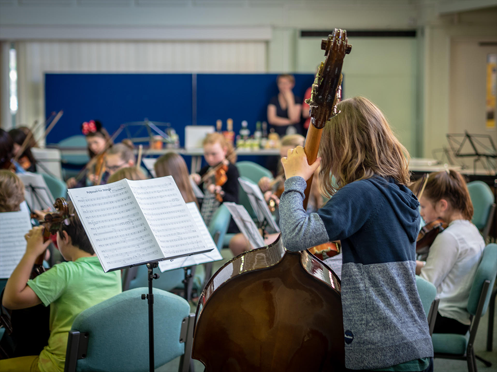 children playing instruments together at the music centre